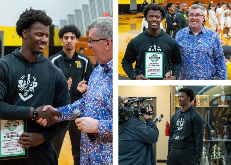 DE’SHAWN HICKS being handed a plaque